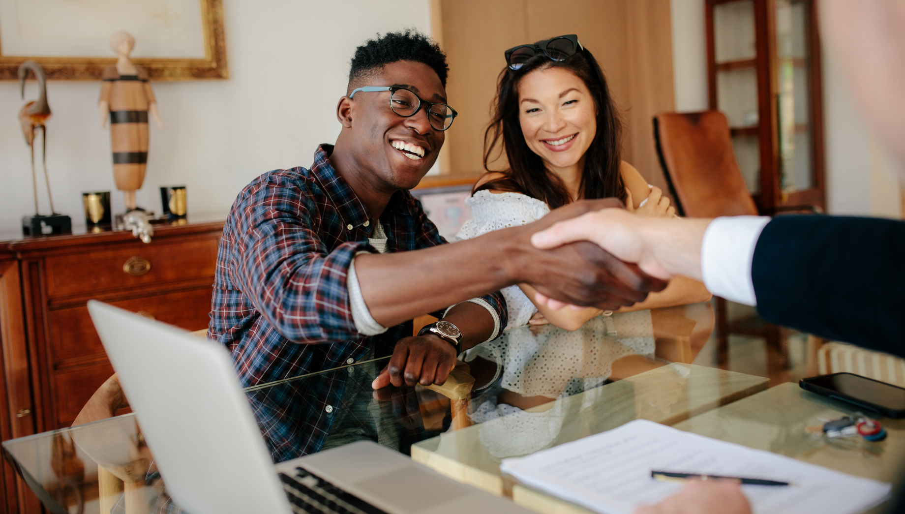 Couple Handshaking Realtor 